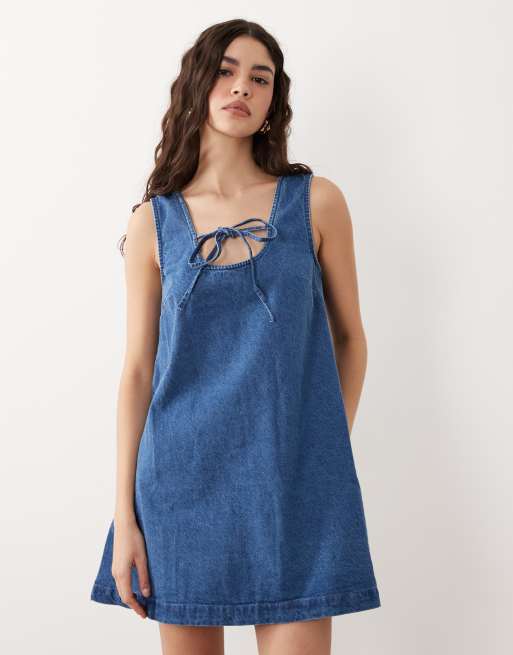 ASOS DESIGN denim scoop mini dress with bow front in light blue, 2 of 4