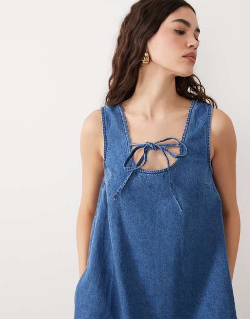 ASOS DESIGN denim scoop mini dress with bow front in light blue, 3 of 4