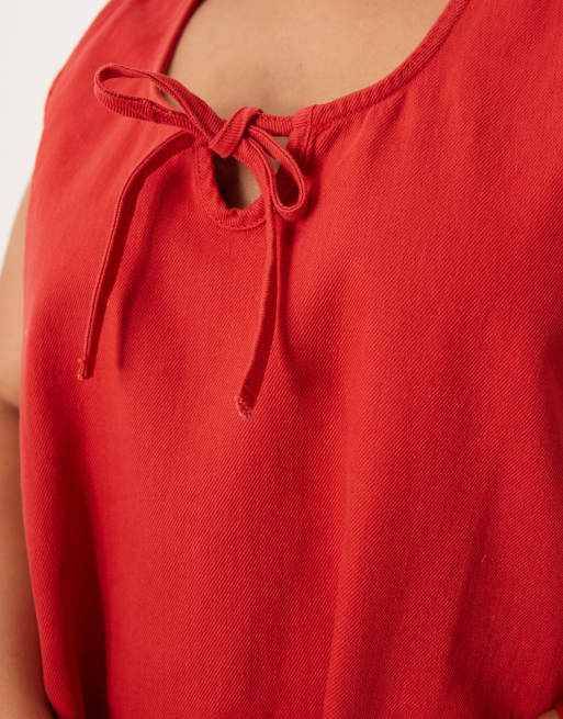ASOS DESIGN denim scoop mini dress with bow front in red
