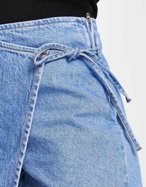 ASOS DESIGN denim skort in midwash blue