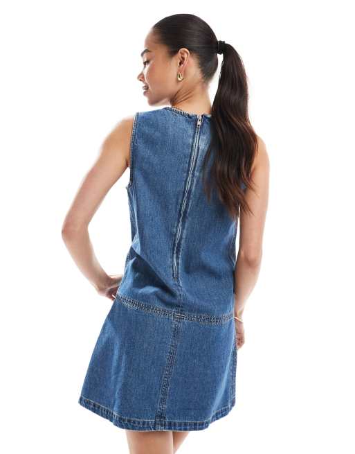 ASOS DESIGN denim sleeveless mini dress with pleated drop waist in midwash blue