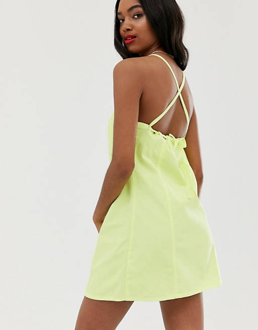 ASOS DESIGN denim sundress with tie back in washed neon lime | ASOS