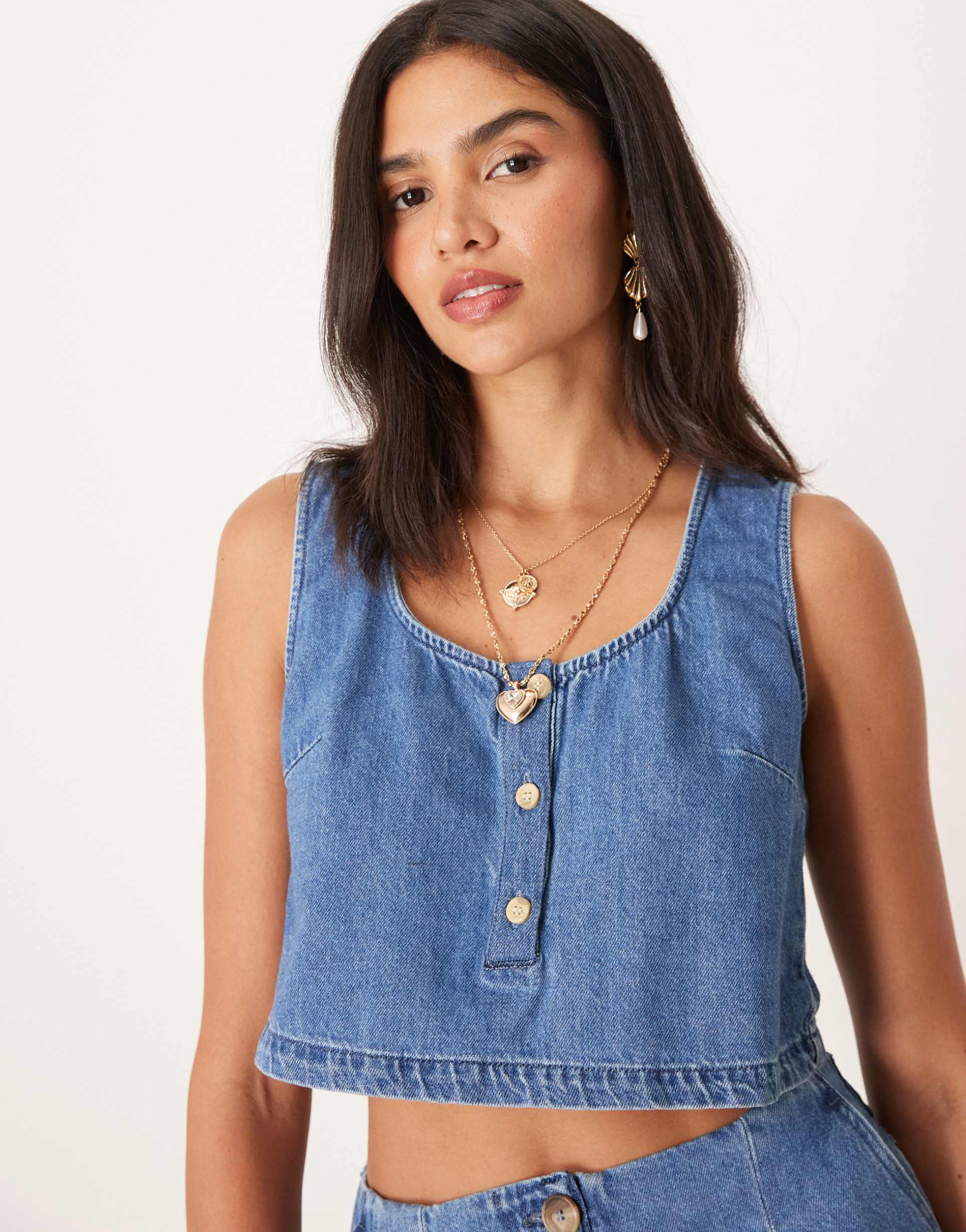 asos design denim tank top with button front in midwash blue