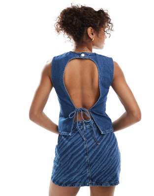 denim tank top with open tie up back in indigo-Blue