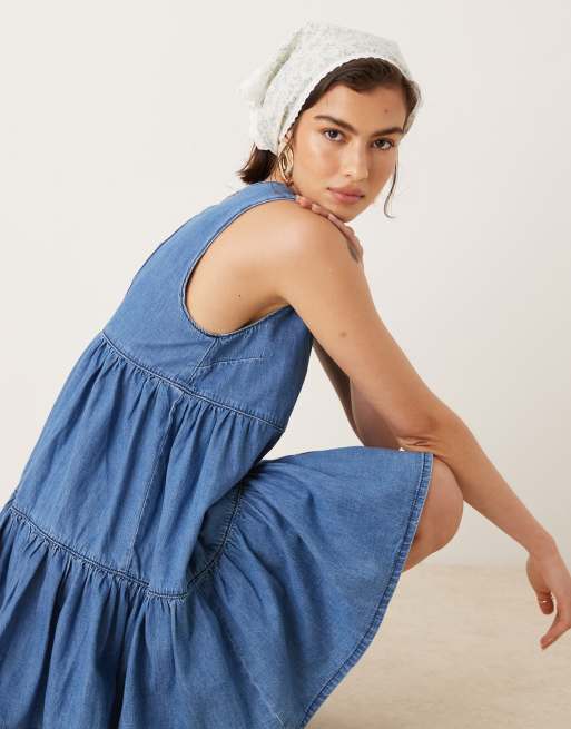 ASOS DESIGN denim tiered mini dress in mid wash blue