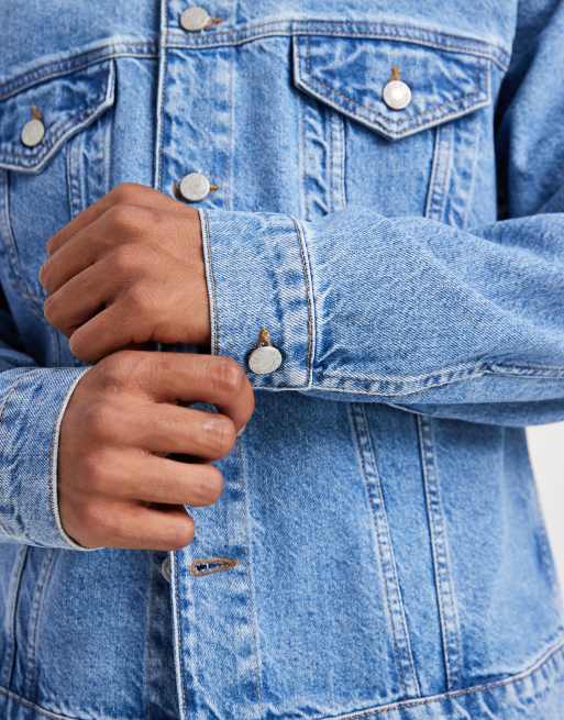 ASOS DESIGN denim trucker jacket in midwash blue