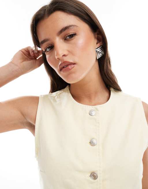ASOS DESIGN denim vest in butter yellow