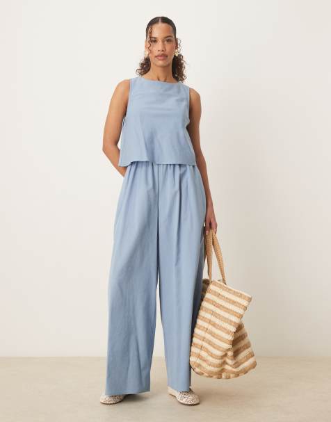 ASOS DESIGN - Denimblå jumpsuit med dobbeltlag og åben ryg - view 1