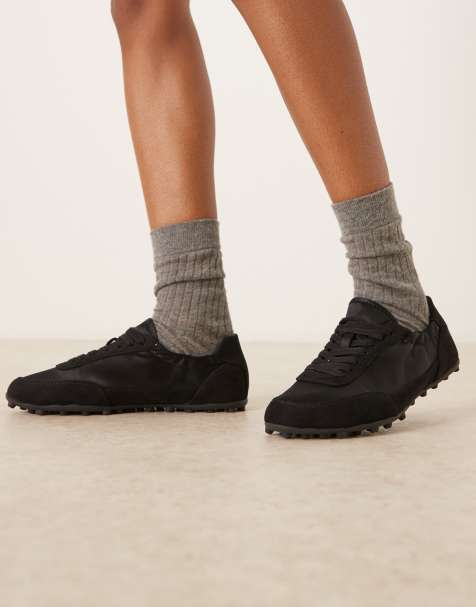 ASOS DESIGN – Desire – Sneaker zum Schnüren in Schwarz mit schmaler Sohle - view 1