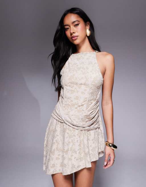 ASOS DESIGN devore halter mini dress with drape detail in stone