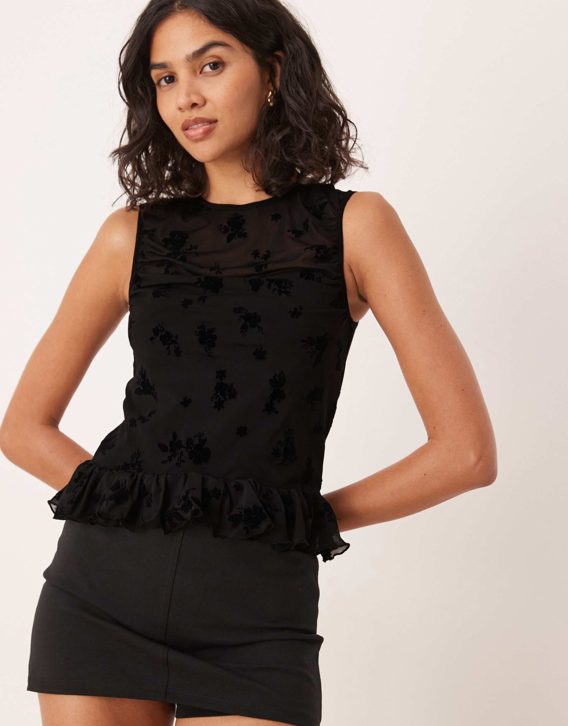 asos design devore ruched top with peplum hem in black