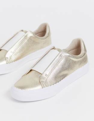 gold slip on trainers
