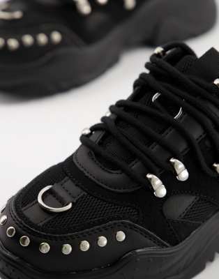 studded black trainers