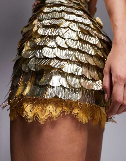 ASOS DESIGN disc embellished curved neckline shift dress with lace underlay in gold