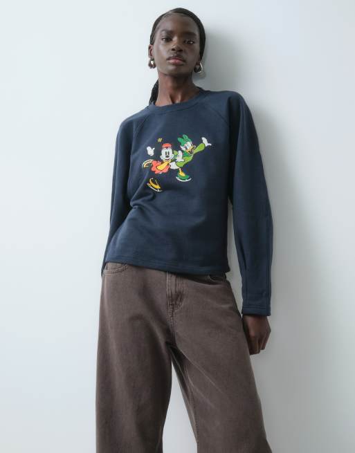 ASOS DESIGN Disney balloon sleeve sweatshirt with Minnie and Daisy print in navy, 3 of 5
