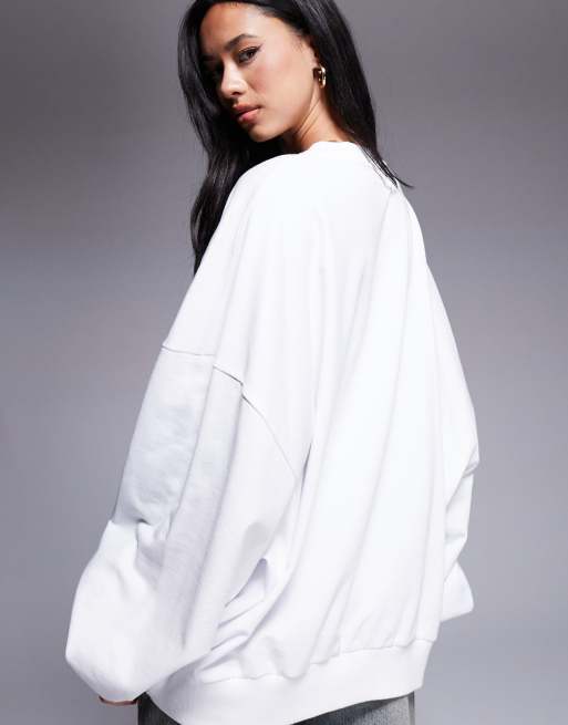ASOS DESIGN Disney Christmas extreme oversized sweatshirt with Stitch front print in white