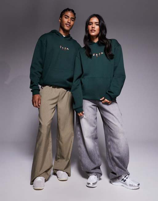 ASOS DESIGN Disney Christmas Relaxed hoodie with Mickey & friends prints in dark green