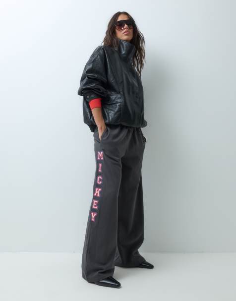 ASOS DESIGN Disney jogger a gamba larga con ricamo Mickey nero - view 1