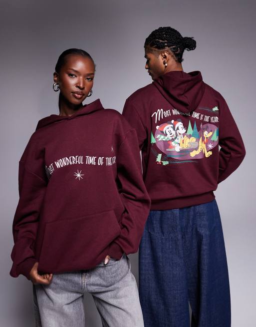 ASOS DESIGN – Disney – Mörkt vinröd, avslappnad huvtröja i unisex-modell med juligt tryck med Musse Pigg och hans vänner