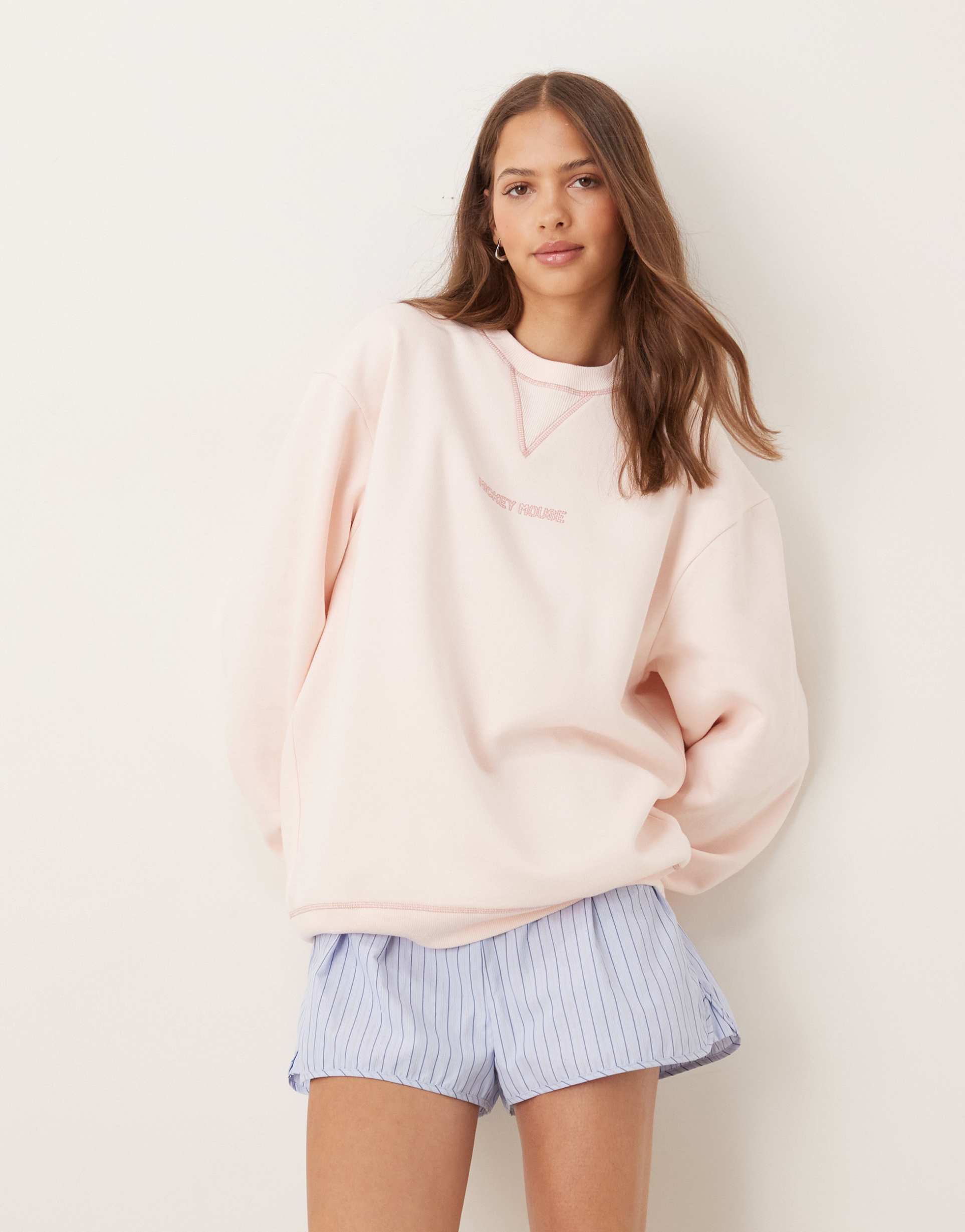 asos design disney oversize sweatshirt with mickey mouse print in baby pink