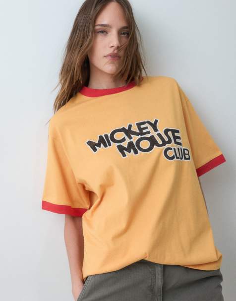 ASOS DESIGN Disney oversized ringer t-shirt with Mickey Mouse Club print in orange - view 1