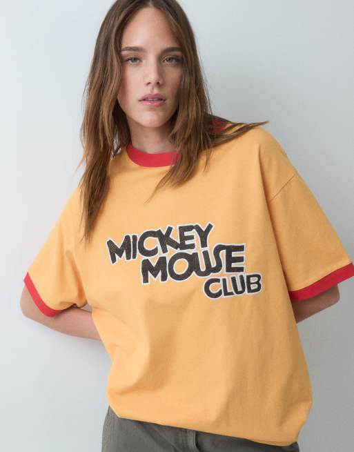 ASOS DESIGN Disney oversized ringer t-shirt with Mickey Mouse Club print in orange, 5 of 5