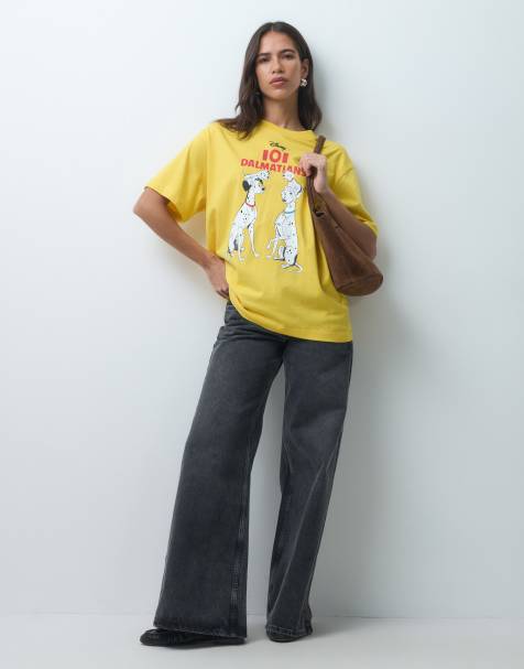 ASOS DESIGN Disney oversized t-shirt with 101 Dalmatian print in yellow - view 1
