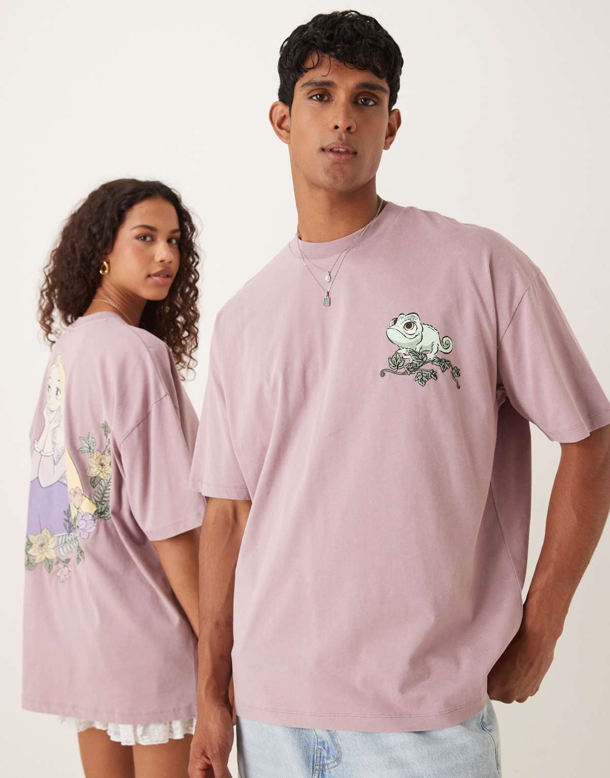 ASOS DESIGN Disney oversized t-shirt with Tangled prints in pink