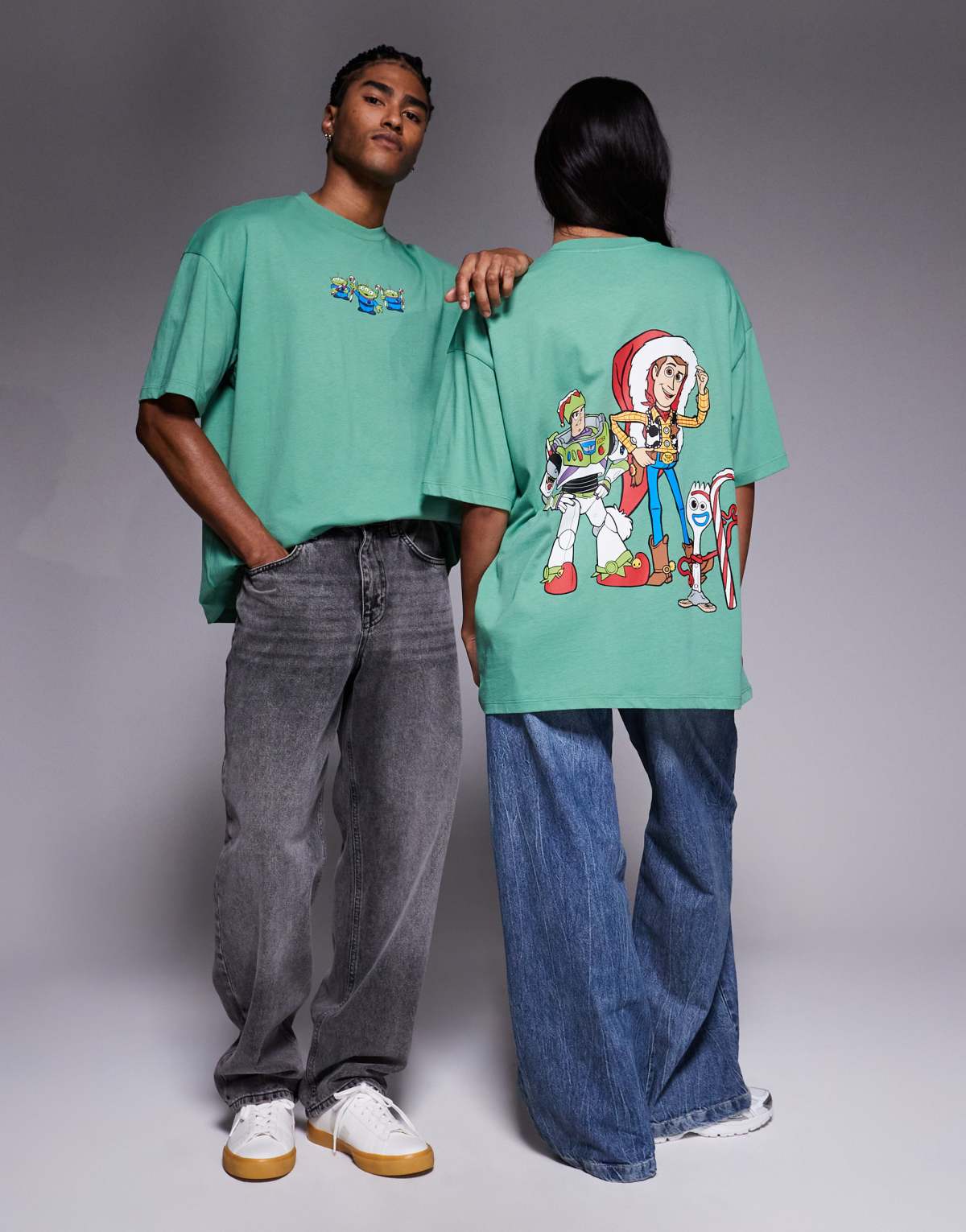 ASOS DESIGN Disney Pixar Christmas oversized t-shirt with Toy Story prints  in green