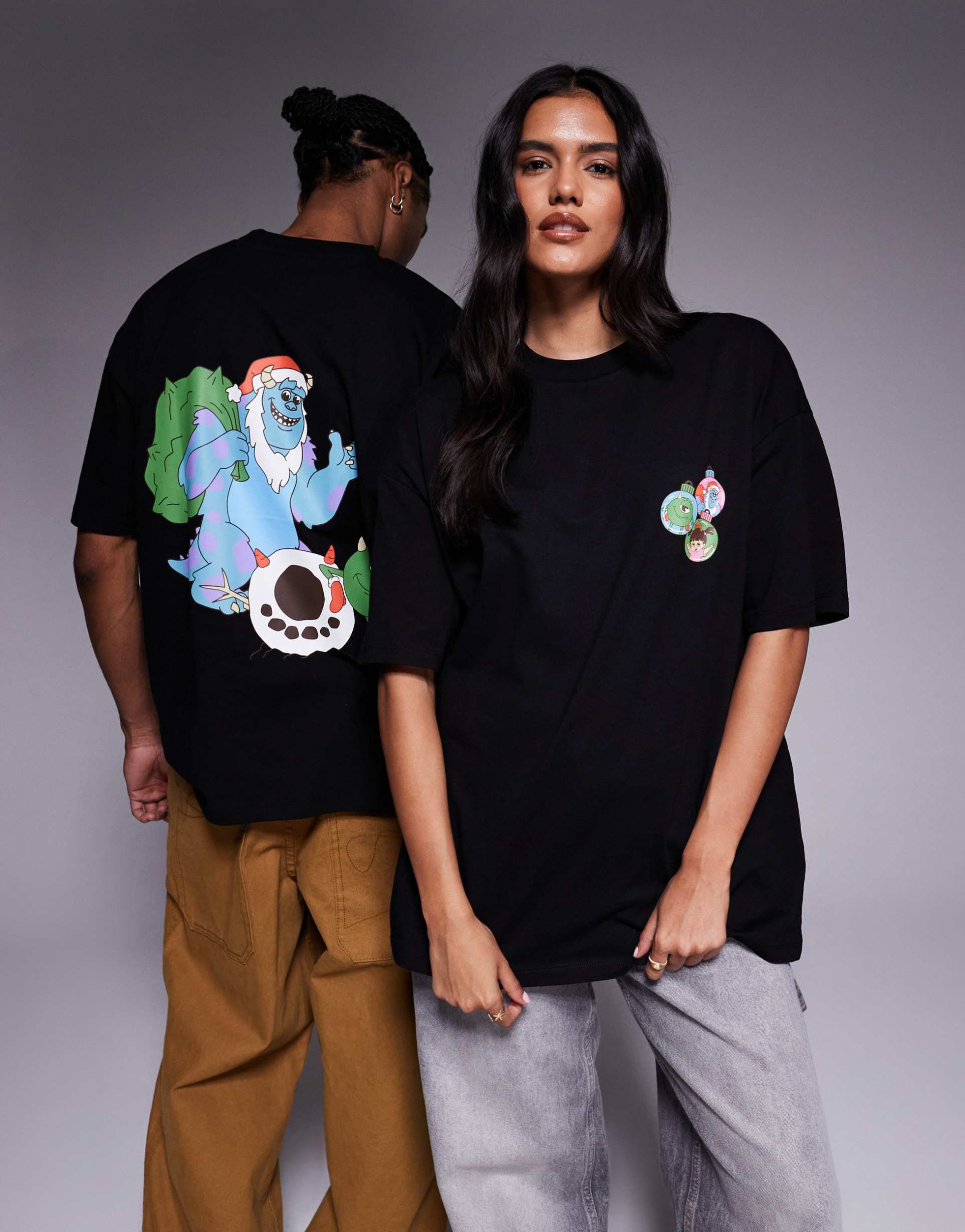 asos design disney pixar christmas unisex oversized t-shirt with monsters inc. prints in black