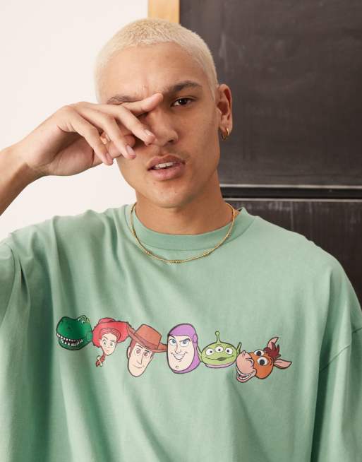 ASOS DESIGN Disney Pixar oversized t-shirt with Toy Story prints in washed green