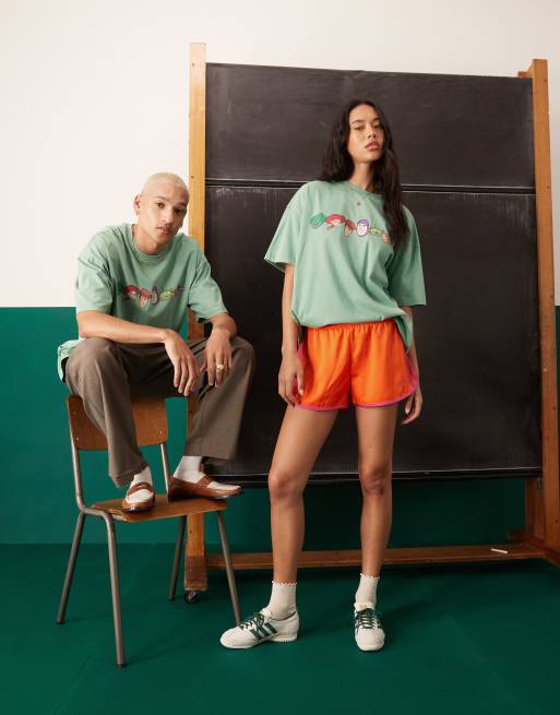 ASOS DESIGN Disney Pixar oversized t-shirt with Toy Story prints in washed green