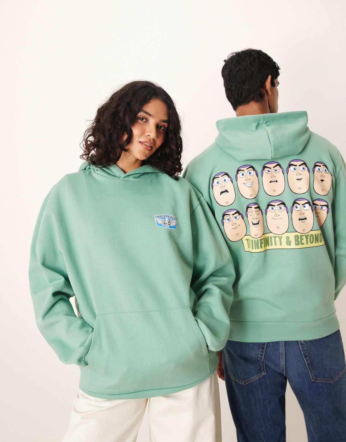 ASOS DESIGN Disney Pixar unisex oversize hoodie with Toy Story Buzz Lightyear print in green