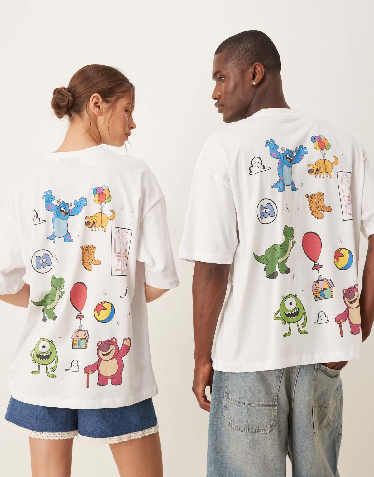 ASOS DESIGN Disney Pixar unisex oversized t-shirt with multi character prints in white