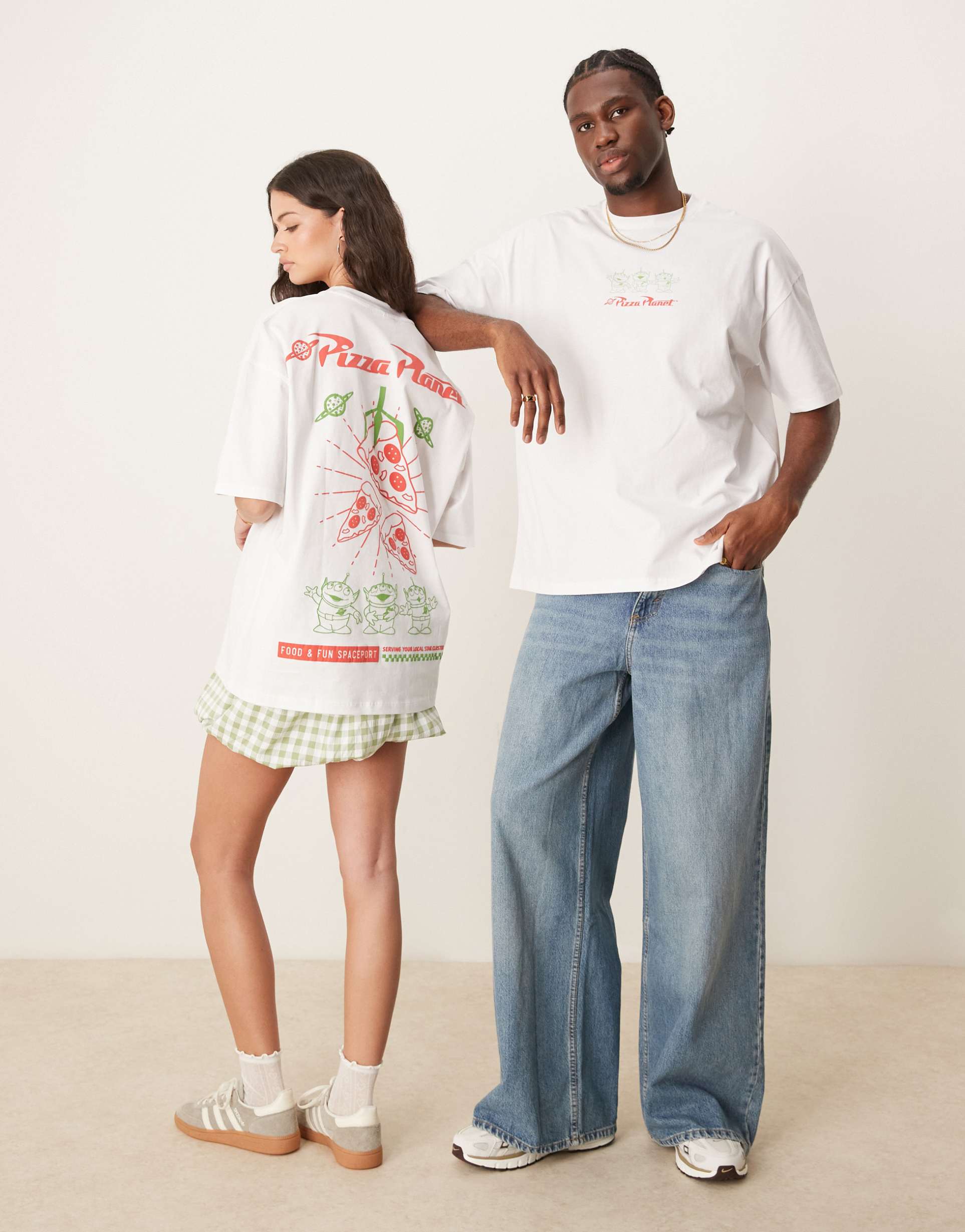 asos design disney pixar unisex oversized t-shirt with toy story pizza planet prints in white