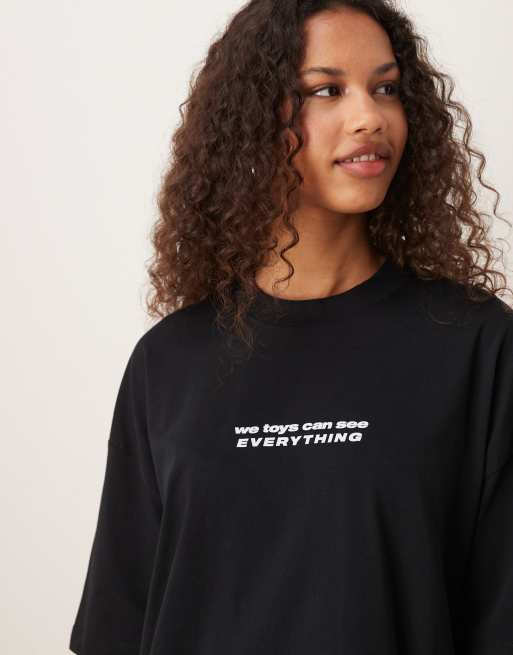 ASOS DESIGN Disney Pixar unisex oversized t-shirt with Toy Story Sid prints in black
