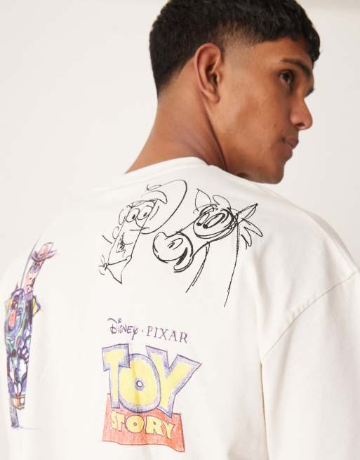 ASOS DESIGN Disney Pixar unisex oversized t-shirt with Toy Story sketch  prints in beige | ASOS