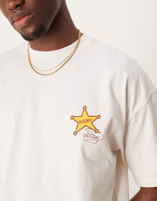 ASOS DESIGN Disney Pixar unisex oversized t-shirt with Toy Story Woody & Jessie prints in stone