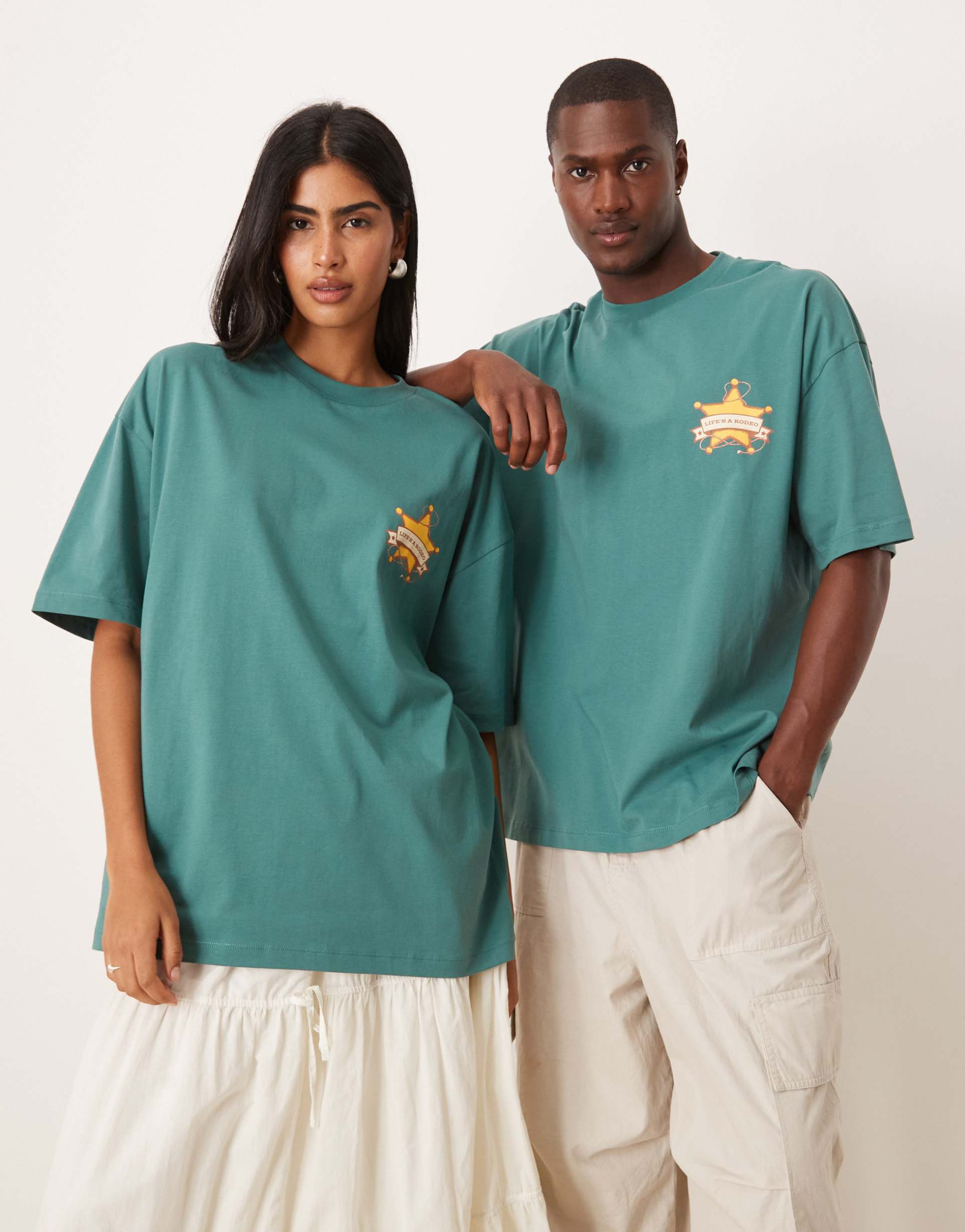 asos design disney pixar unisex oversized t-shirt with woody toy story prints in green