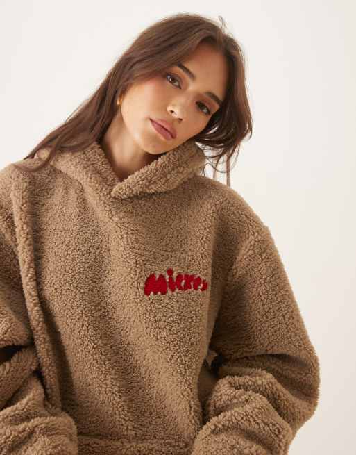 ASOS DESIGN Disney oversized borg hoodie with Mickey Mouse print in beige