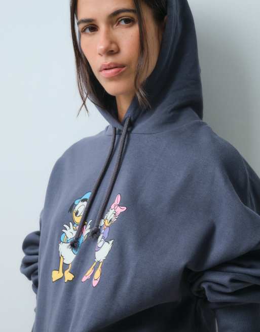 ASOS DESIGN Disney sweat à capuche imprimé Donald et Daisy bleu, 2 de 5