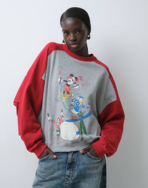 ASOS DESIGN Disney sweatshirt with Mickey and friends ski print with pleat sleeve detail in grey - view 1