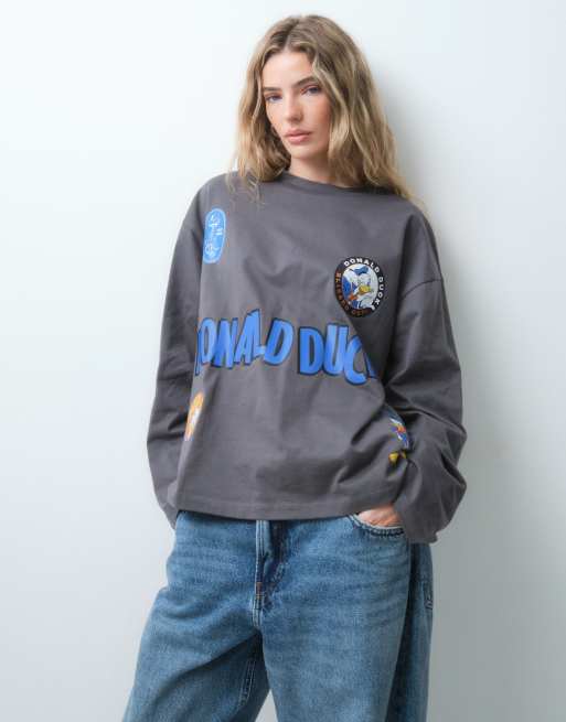 ASOS DESIGN Disney T-shirt oversize a maniche lunghe con stampa di Paperino nera, 3 di 10