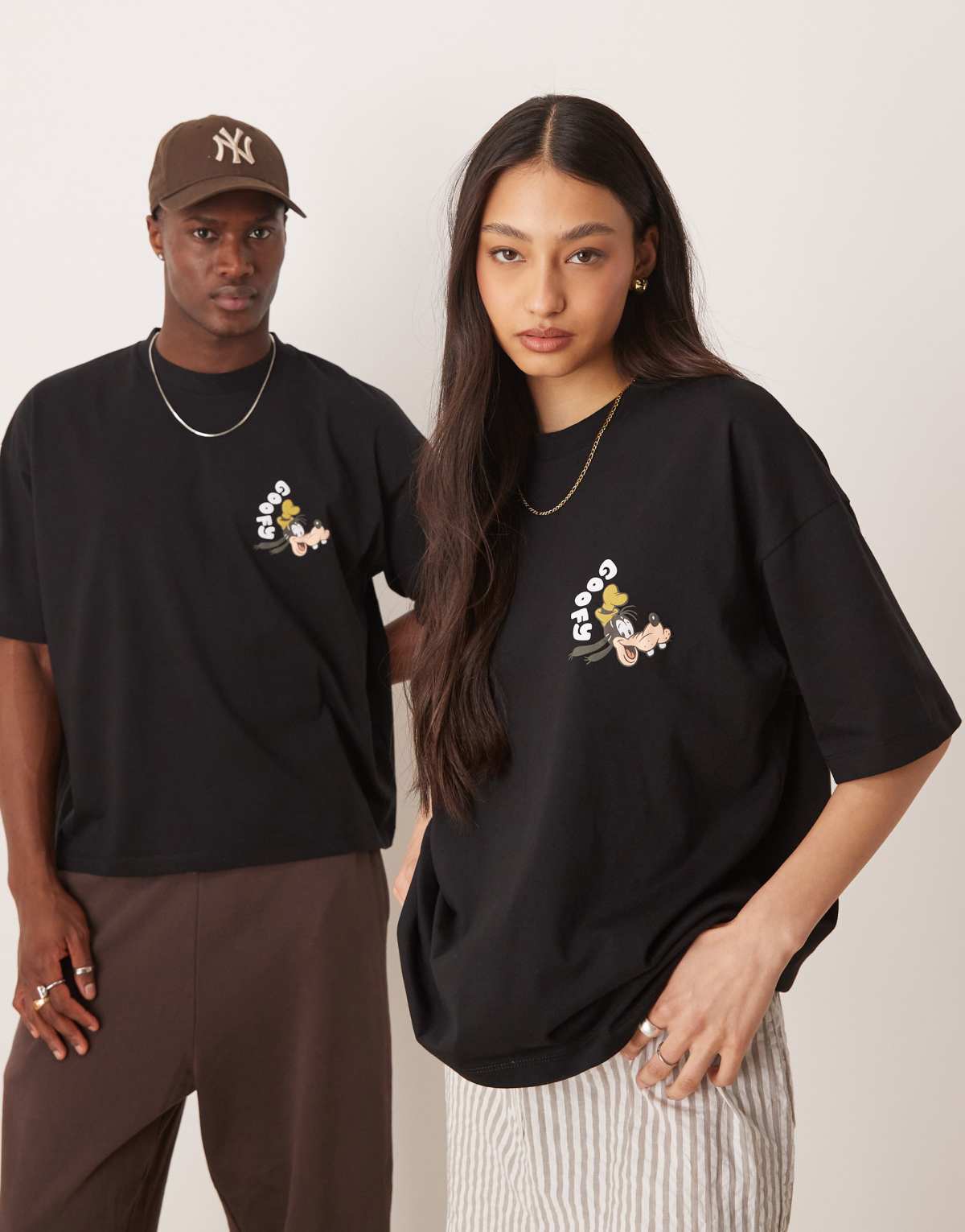 ASOS DESIGN Disney unisex boxy oversized t-shirt with Goofy prints in black