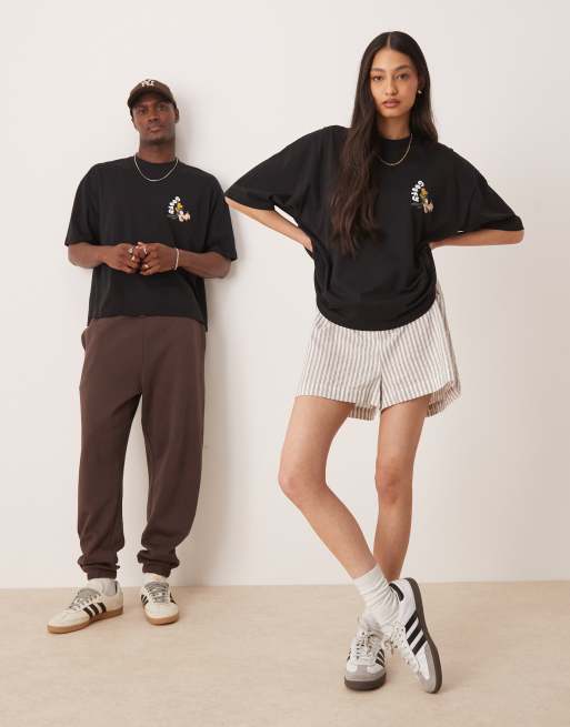ASOS DESIGN – Disney – Unisex – Kastiges Oversize-T-Shirt in Schwarz mit Goofy-Prints