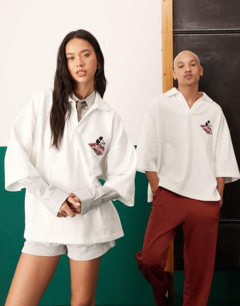 ASOS DESIGN Disney unisex oversize polo with embroidered Mickey Mouse print in off white - view 1