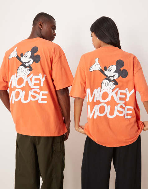 ASOS DESIGN – Disney – Unisex – Oversize-T-Shirt in verwaschenem Orange mit Mickey-Maus-Prints - view 1
