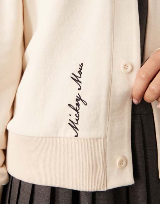 ASOS DESIGN Disney Unisex oversized cream cardigan with Mickey Mouse embroidered print