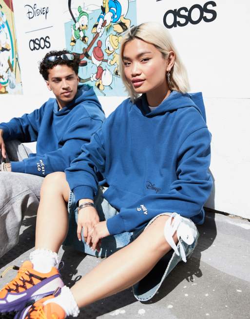 ASOS DESIGN Disney unisex oversized hoodie with Mickey Mouse & Friends prints in blue, 2 of 5