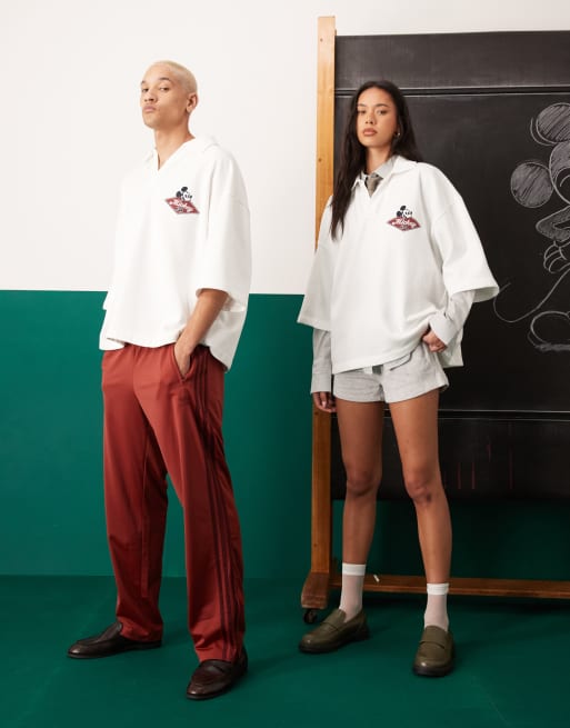 ASOS DESIGN Disney Unisex oversized polo shirt with embroidered Mickey Mouse prints in off white